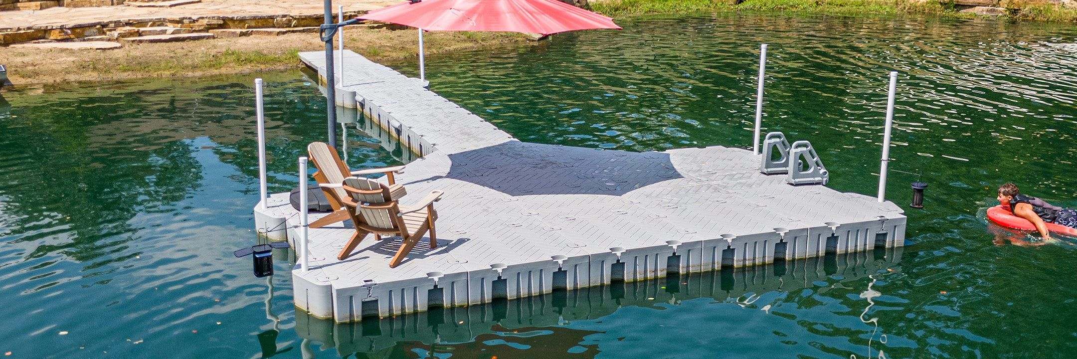 Easy to install floating dock with chairs, ladder and umbrella